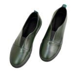 Женские кожаные зеленые туфли на утолщенной черной подошве